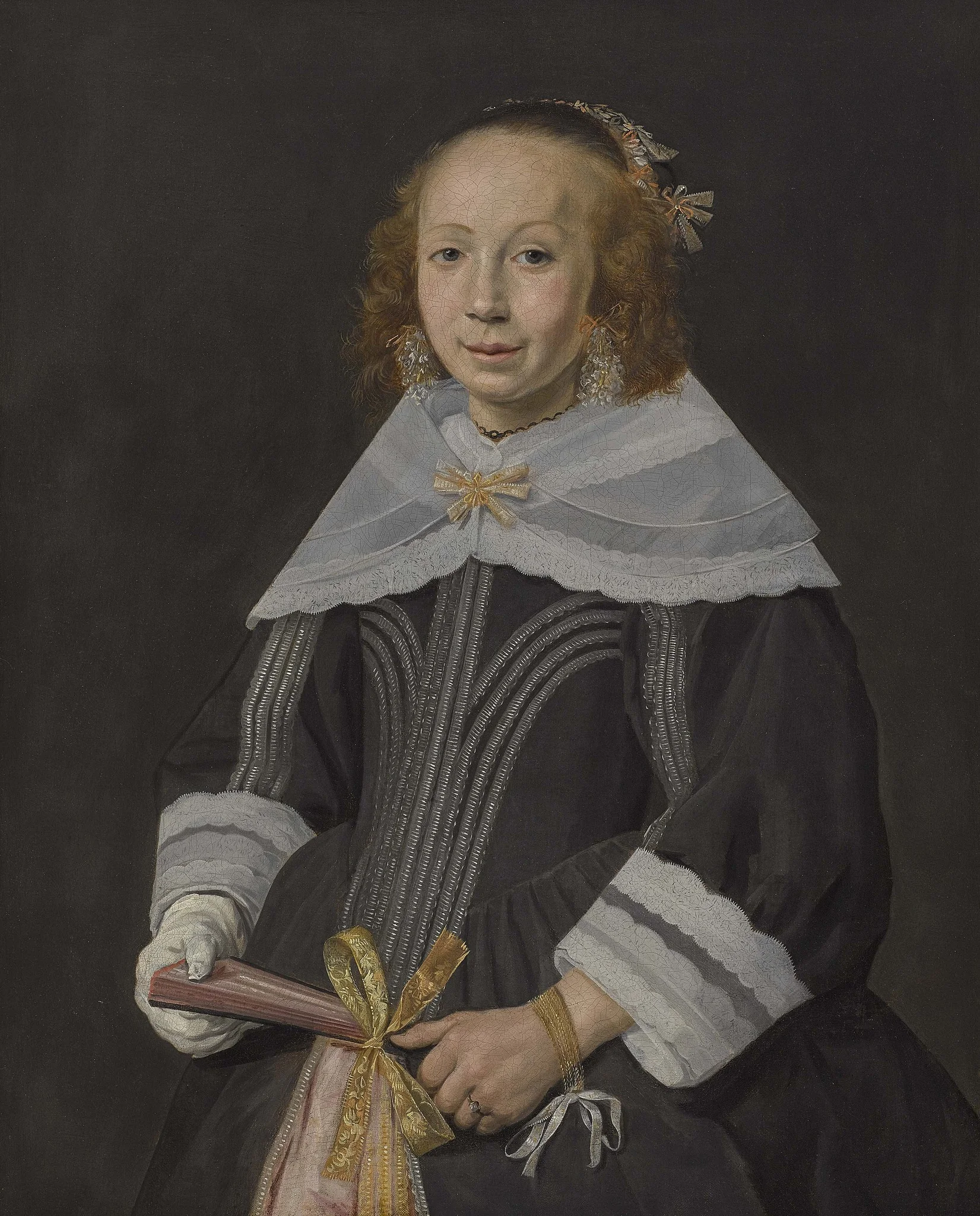 Portrait of a young woman holding a fan, detail