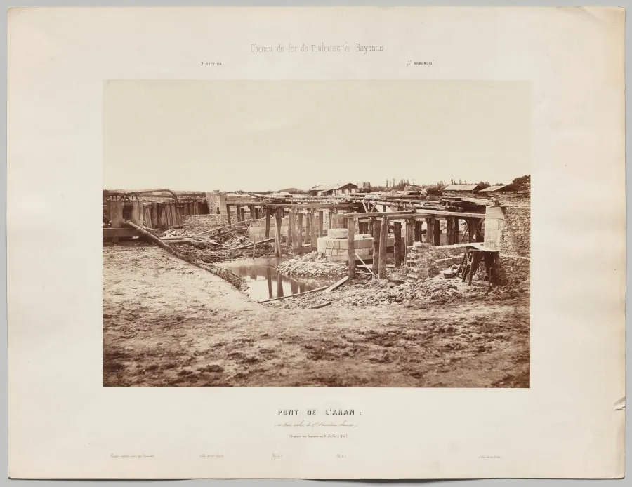 Chemin de fer de Toulouse à Bayonne. Pont de l'Aran (en trois arches de 17m d'ouverture chacune). Situation des travaux au 21 juillet 1861, by Édouard Baldus, 1861