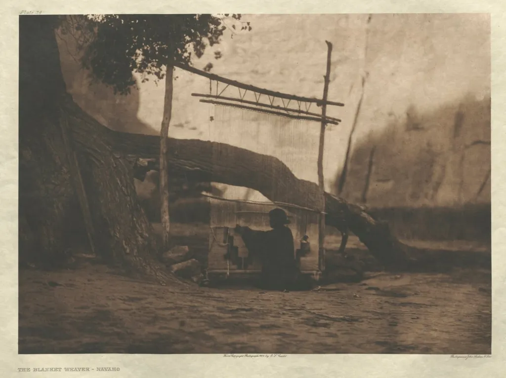 Portfolio I, Plate 34: The Blanket Weaver-Navaho, by Edward S. Curtis, 1904