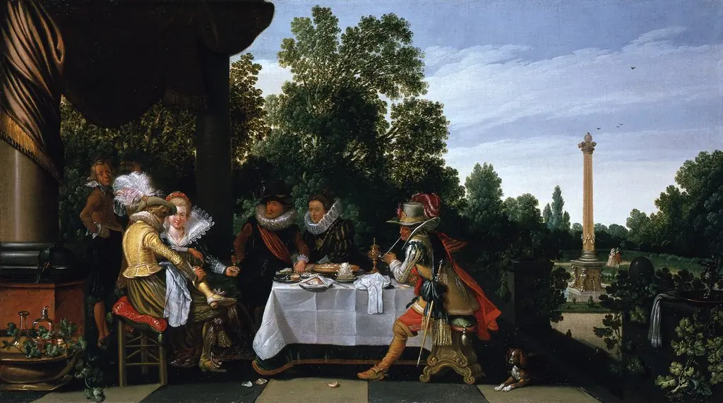 Elegant company eating, drinking, smoking and in conversation on a terrace, by Esaias van de Velde