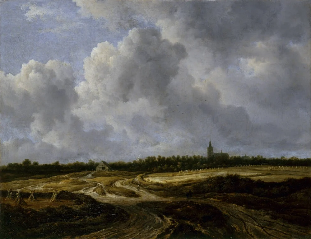 Extensive field landscape with a track and a church in the distance, detail