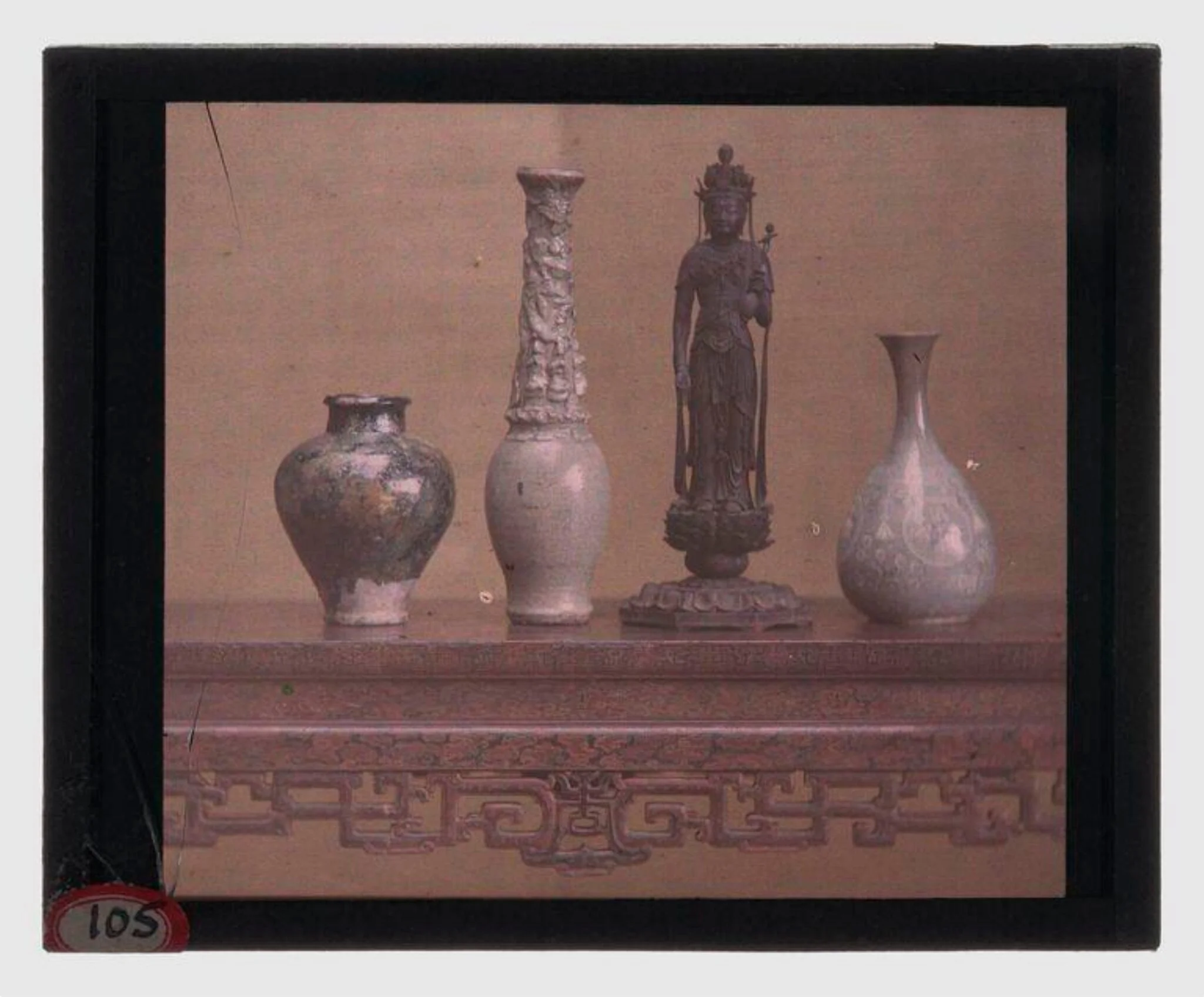 'Jar, Raqqa, Syria, 12th-13th century', 'Funderary Jar', China, 13th century', 'Bodhisattva Avalokiteshvara (Kannon)', Japan, late 12th century, 'Pear-shaped bottle', Korea, late 13th-early 14th century, 'Table with dragon decoration', China, probably 18th century, from the Charles Lang Freer Collection, detail