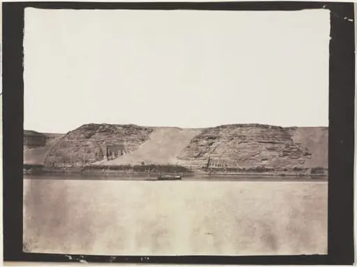 General View of Monuments Carved into Bedrock with Photographer's Dahabieh. Abu Simbel, by Félix Teynard