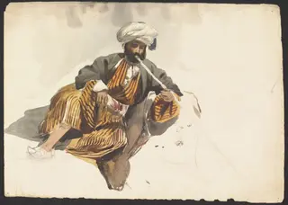 Figure of a Man in Arab dress, reclining, smoking a chibouk