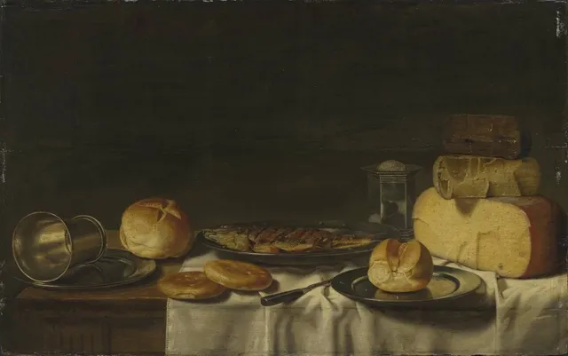 Still life of laid table with cheese