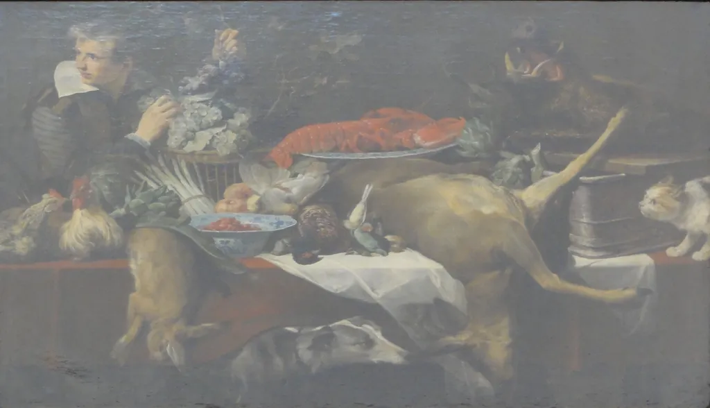Kitchen scene with game and vegetables, with a serving boy holding a bunch of grapes, by Frans Snyders, oil, 1617