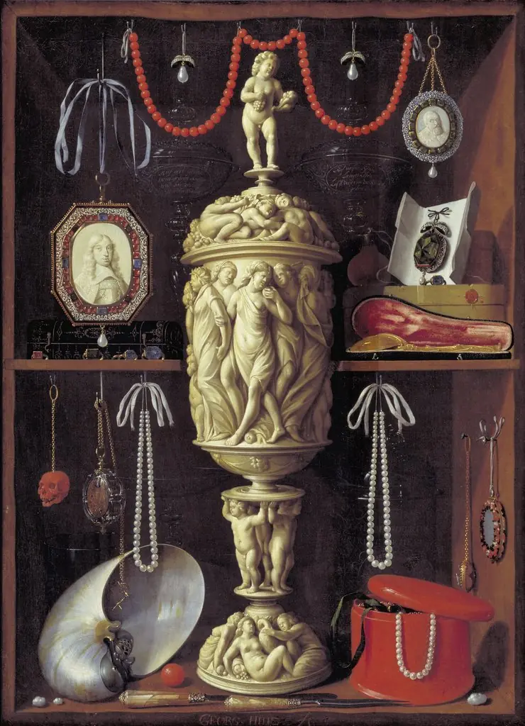 A collector's cabinet with ivory cup, by Georg Hainz