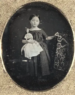Girl with Doll