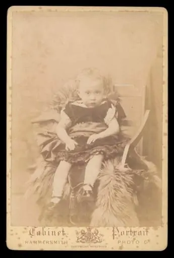 Portrait of a child, by Hammersmith Photographic Co.