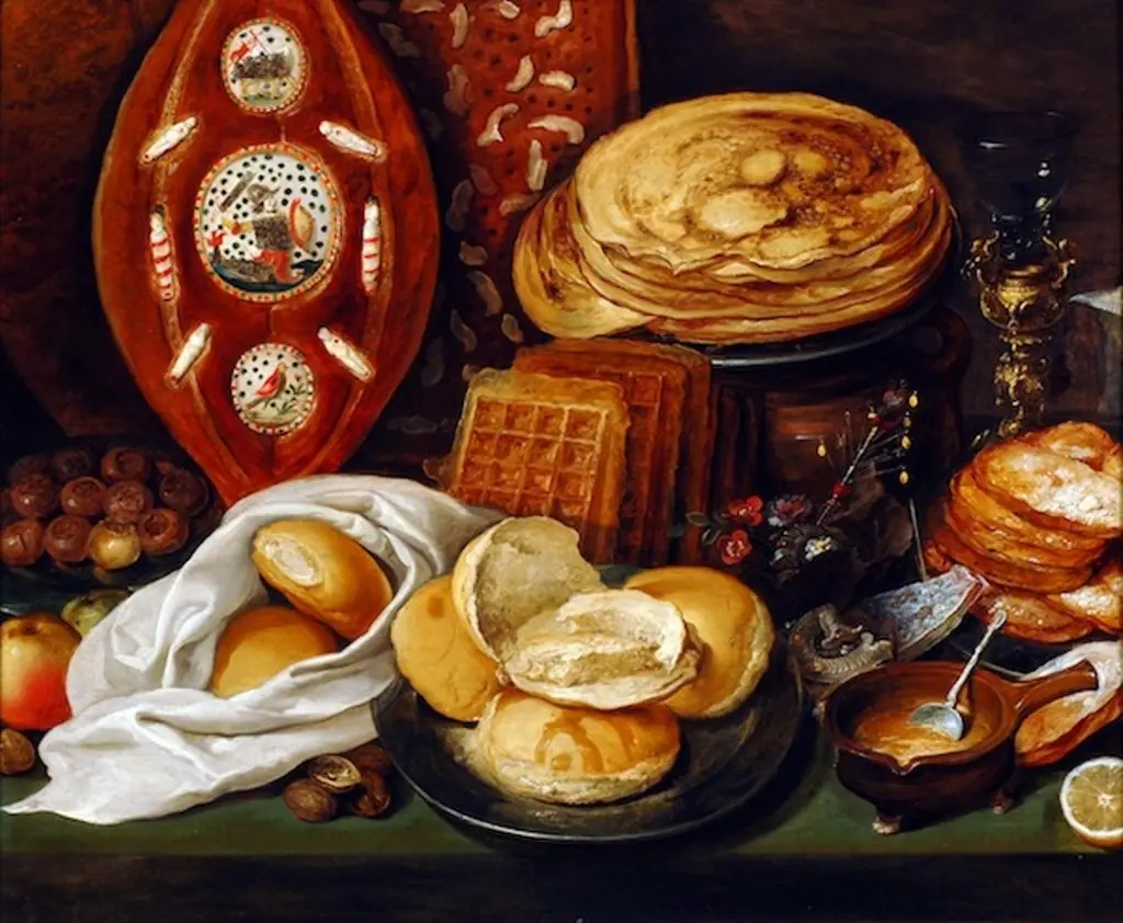 Winter still life with pancakes, waffles and Christmas bread