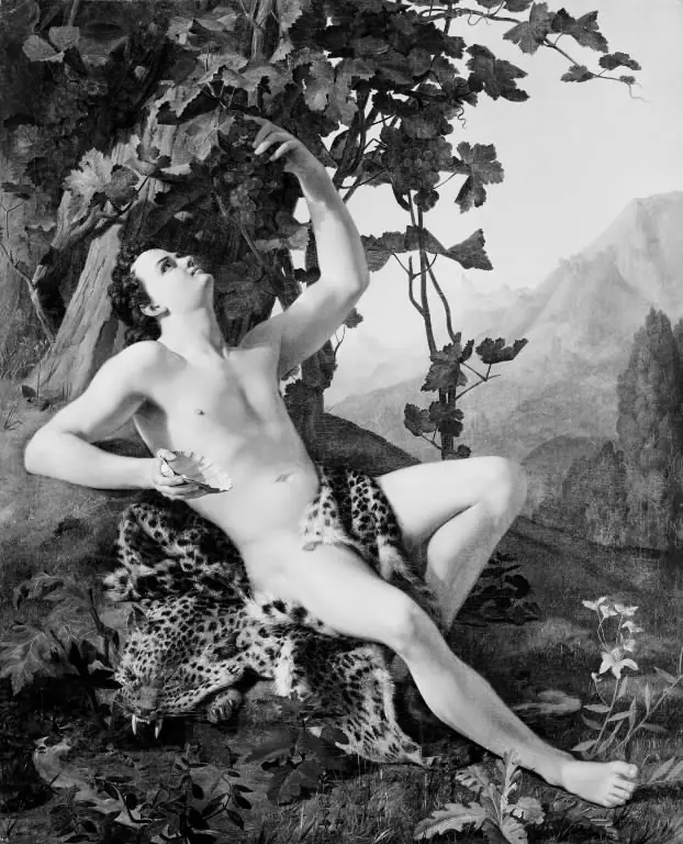 A young faun picking grapes