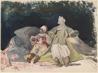 Two Dolls or Puppets Sitting on Cushions