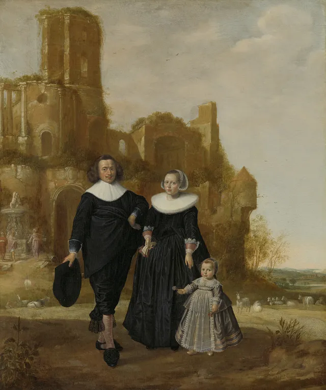 Portrait of a couple with their child in a landscape