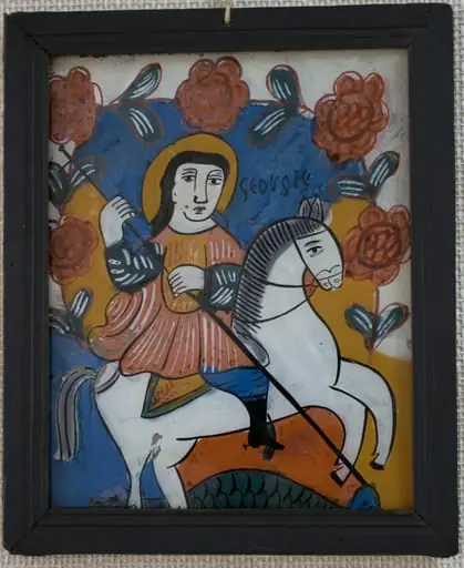 Icoana este pictată "în oglindă", pe un suport de sticlă de formă dreptunghiulară în ax vertical. Tema iconografică: Sfântul Gheorghe omorând balaurul. Sfântul, călare pe cal alb, este plasat în centrul icoanei. Veșminte ostășești, cizme înalte, tunică scurtă, roșie, cu mâneci verzi, pantaloni albaștri, bufanți.Capul descoperit, părul lung, negru, revărsat pe umeri. Aureola trasată cu mâna liberă. În mână ține o suliță lungă pe care o înfige în gura balaurului reptilian, verde, simbolizând zonele inferioare, ale păcatului. În jumătaea superioară o ghirlandă de trandafiri dispusă în arcadă deasupra sfântului. Icoana are caracteristici specifice picturii niculene: stângăcia, simplitatea și primitivismul desenului; compoziția sumară,este mai încărcată totuși decât la icoanele niculene din prima perioadă. Paleta cromatică sobră, culorile intense:alb, orange, roșu, verde, albastru, negru. Rama profilată, de culoare neagră, dosul din scândură subțire de brad.
