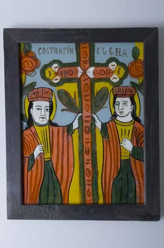 Icoana este pictată pe sticlă, cu reprezentarea Sfinților Împărați Constantin și Elena, îmbrăcați în veșminte împărătești, redați de o parte și de cealaltă a crucii. Deasupra Sfinților este înscris textul: „Constantin