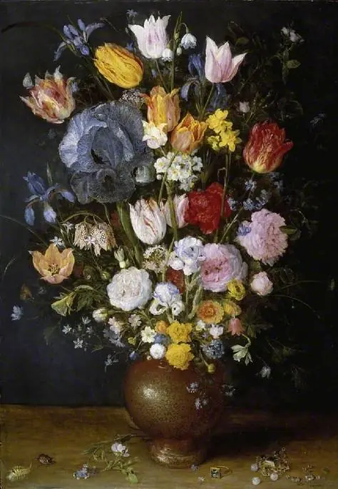A stoneware vase of flowers