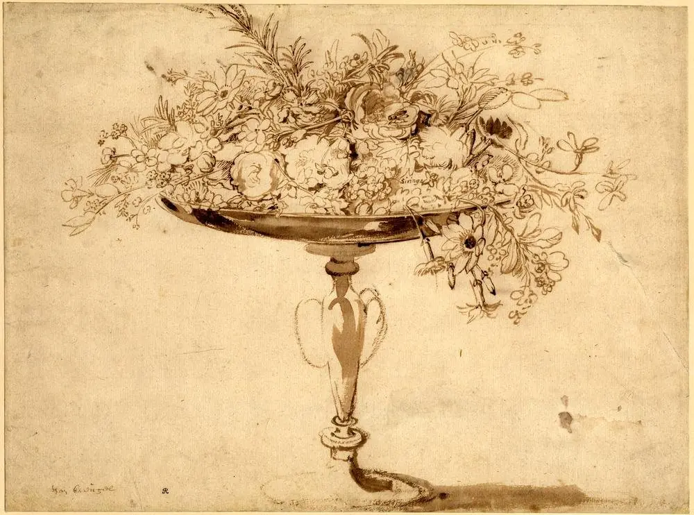 A tazza-shaped vase with flowers tumbling over the bowl
