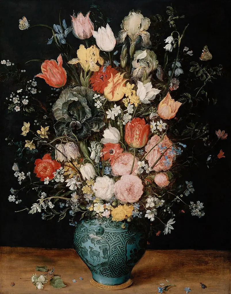 Chinese porcelain vase of flowers on a tabletop