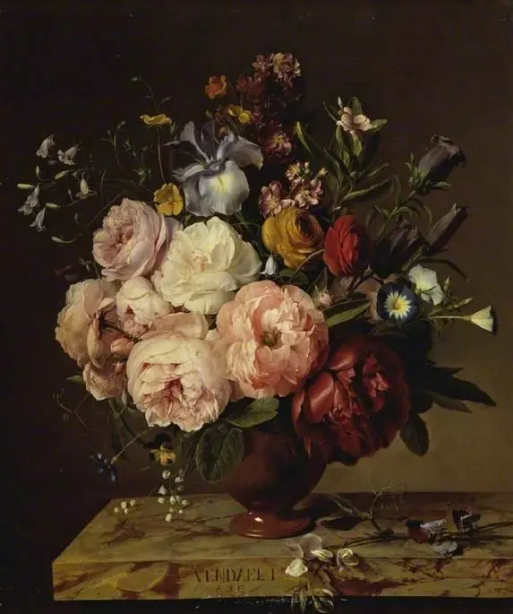 A vase of flowers on a ledge