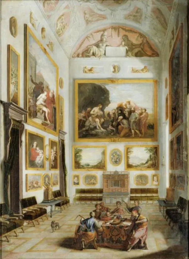 Interior with a collection of paintings and musicians around a table, by Jan Onghers