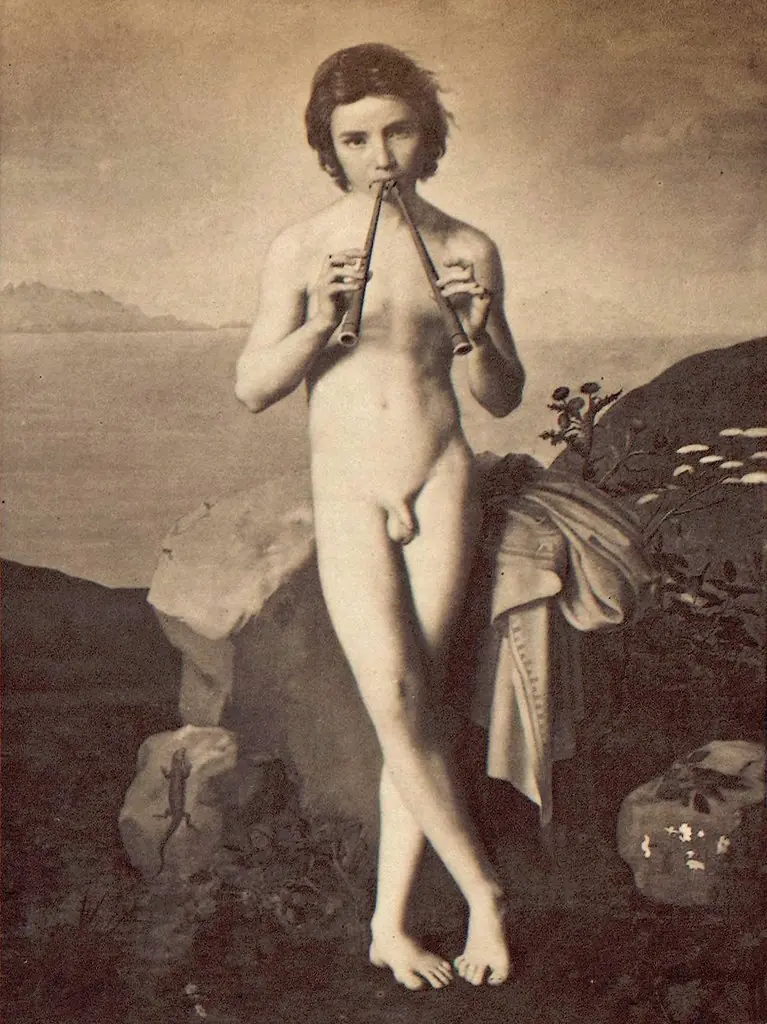 A young flute player by the sea