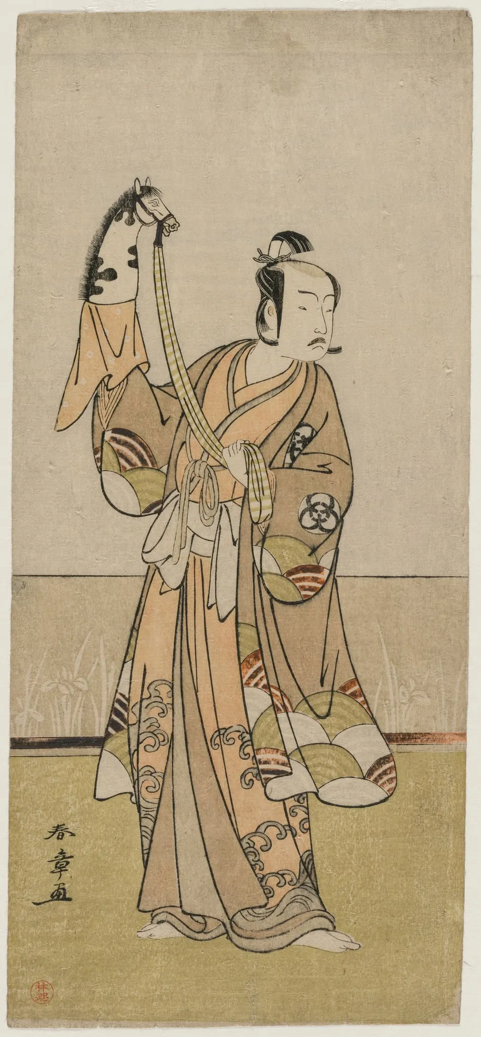 Bando Hikosaburo III Holding a Hand Pupper, by Katsukawa Shunshō, 1774