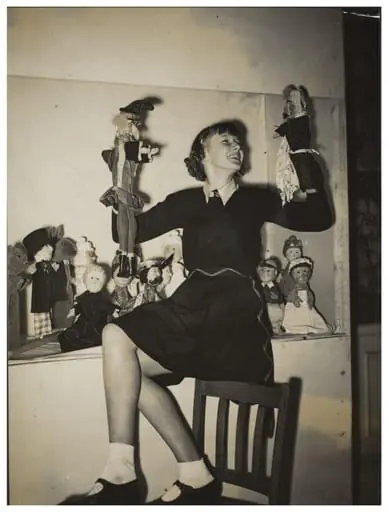 Photograph of Molly Sheldrake, taken to advertise the opening of the 13th Exhibition of the British Puppet and Model Theatre Guild, 1938, by Keystone Press Agency Ltd.
