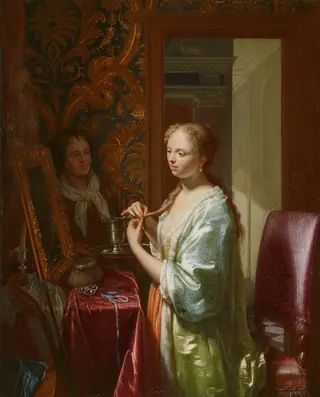 Lady attending to her toilet