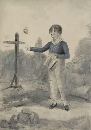 Boy with a book on a country lane
