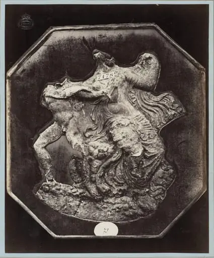 Antique bronze circular appliqué, by Louise Laffon