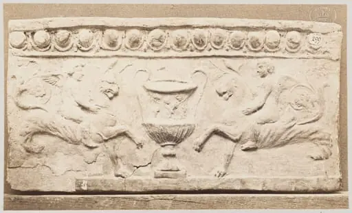 Bas-relief of a large vessel with handles and two bacanallian genies in terra cotta, by Louise Laffon