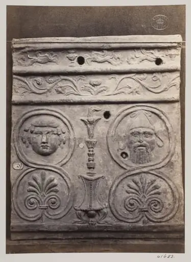 Bas-relief of a portion of a frieze of a thymiaterion and bacanallian masks in terra cotta, by Louise Laffon