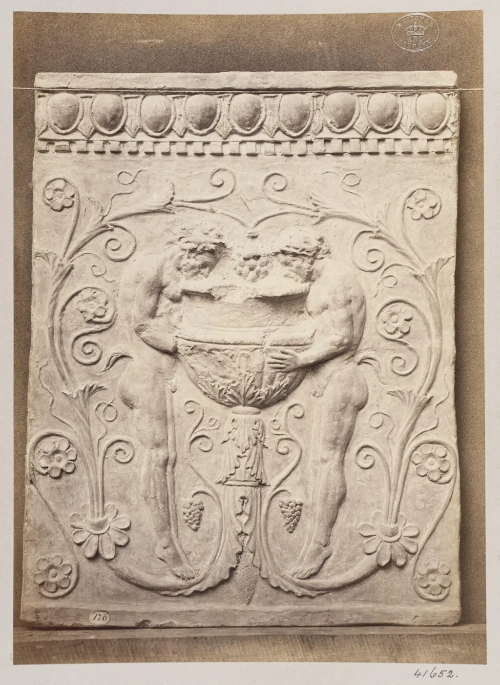 Bas-relief of a portion of a frieze showing two satyrs and a vessel in terra cotta, by Louise Laffon, photographic, 1864