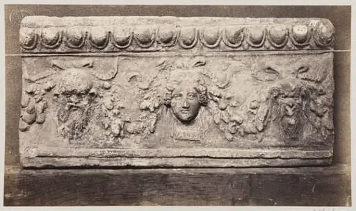 Bas-relief of three baccanalian masques in terra cotta, by Louise Laffon