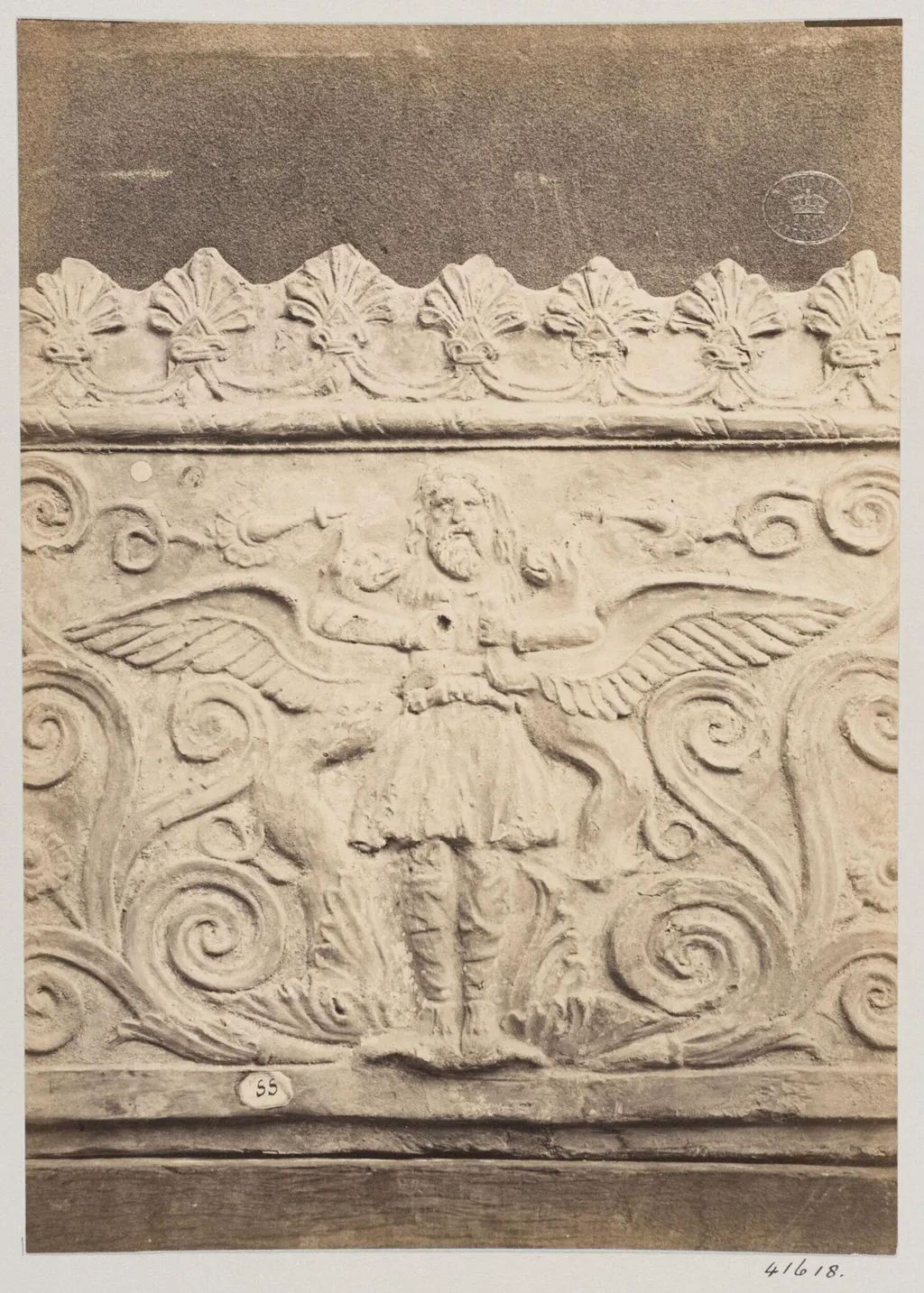 Bas-relief portion of a frieze of a flying genie in terra cotta, by Louise Laffon, photographic, 1864