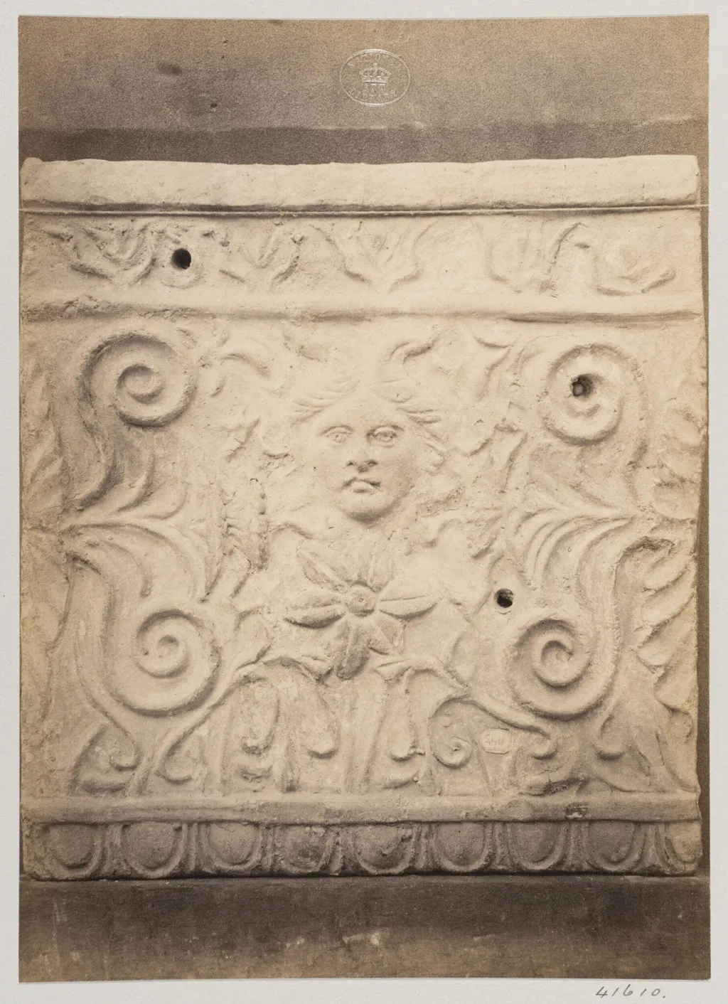 Bas-relief portion of a frieze with a mask in terra cotta, by Louise Laffon, photographic, 1864