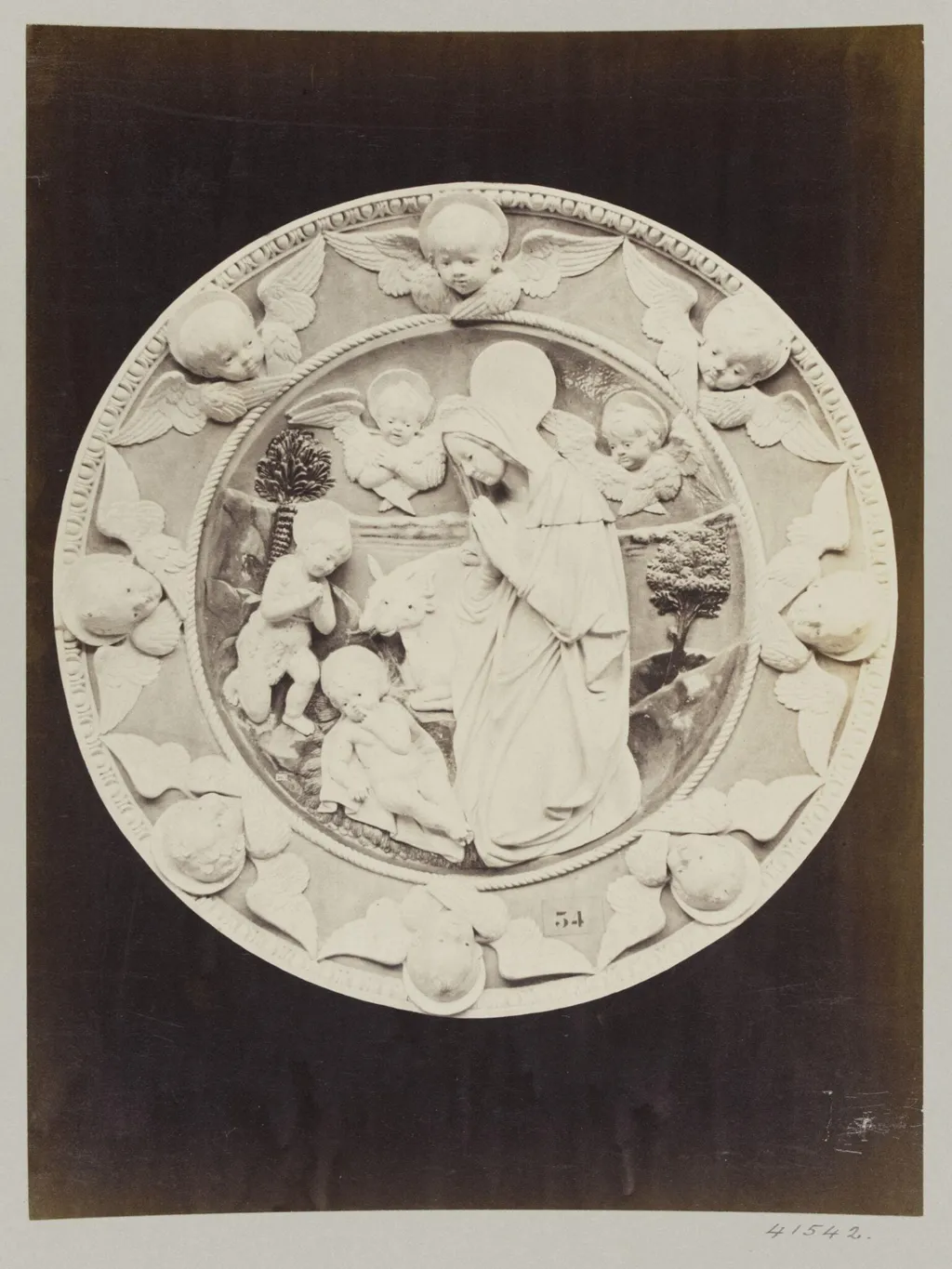 Circular bas-relief depicting the Nativity in enamelled earthenware, by Louise Laffon, photographic, 1864