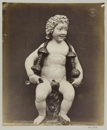 Enamelled earthenware statuette of a child, by Louise Laffon