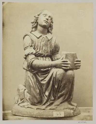 Figure of an angel on her knees in red terra cotta, by Louise Laffon