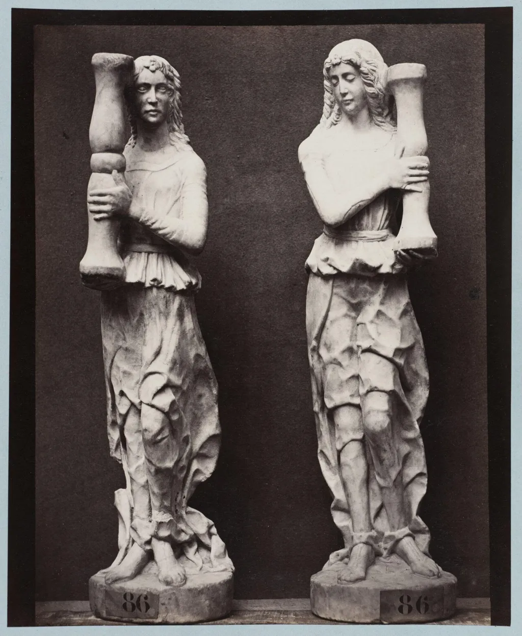 Marble statue of two angels holding torch bearers, by Louise Laffon, photographic, 1864