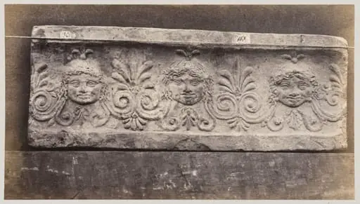 Three masques of gorgons in terra cotta, by Louise Laffon