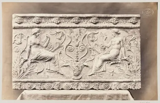 Two female figures seated on foliage ornament, bas-relief in terra cotta, by Louise Laffon