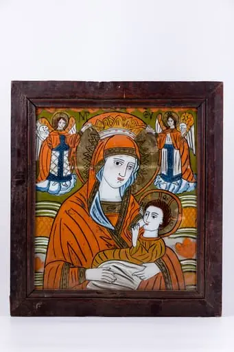 Maica Domnului ține în brațe Pruncul Iisus Hristos, pe care Îl alăptează, din sânul stâng, din dreptul inimii. Pruncul Iisus Hristos ține duios sânul cu ambele mânuțe. Maica Domnului este înveșmântată în mantie cu maforion roșu vermillon și sacos albastru dungat, asemenea unei ii cu gulerașul dantelat, poartă maforion, coroniță de împărăteasă și aureolă. Pruncul Iisus Hristos este înveșmântat în ocru-orange și gri-ivoriu, cu aureolă. În registrul superior, sunt Sfinții Arhangheli Mihail și Gavriil, ținând aureola Maicii Domnului cu mâinile. Sfinții Îngeri Arhangheli au picioarele pe mandorle de nouri alb-albaștri. Fondul icoanei este văzduhul de culoare verde văratic, împodobit cu elemente stilizat-florale, pete de roșu, ruje, în registrul superior. În registrul inferior, este un câmp luminos de verde-orange și galben-ocru. Cromatica este vie, senină și luminoasă: roșu vermillon, alb, albastru cobalt și bleu ciel, verde văratic, mușchi de pădure, verde brad, galben-ocru, alb, negru. Inscripția din româno-chirilică se traduce MP IC XC Maica Domnului Iisus Hristos. Este o icoană de Țara Oltului.