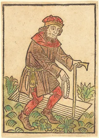 Man Walking Towards a Grave