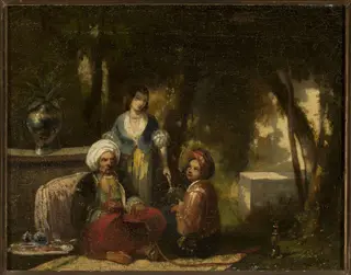 Man with a narghile against forest landscape
