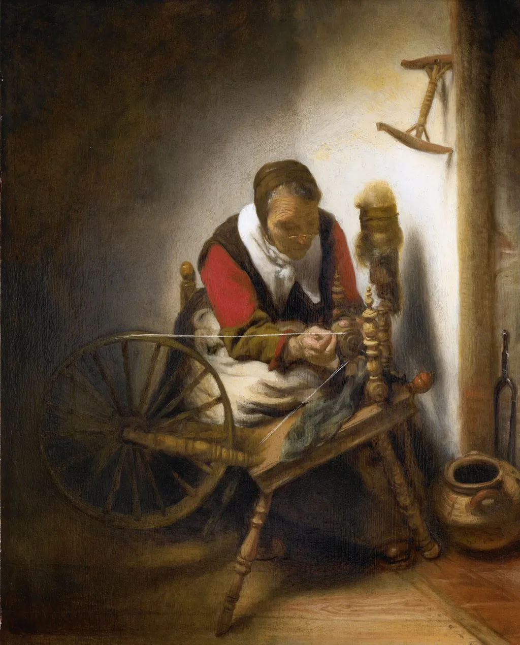 Woman spinning, by Nicolaes Maes, oil, 1655