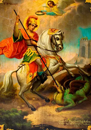 Tema iconografică este "Sfântul Gheorghe omorînd balaurul", realizată într-un stil neoclasic cu accente romantice. Sfântul Gheorghe, înveșmântat ostășește(tipic epocii medievale, cămașă de zale, tunică scurtă, verde, cu franjuri, cizme răsfrânte, mantie roșie, coif metalic cu o pană roșie), călare pe un cal alb, ridicat în două picioare, omoară balaurul cu o suliță. Calul este cabrat, cu harnașament bogat, aurit. Veșmintele sfântului valorate cu auriu. Balaurul,plasat în fața grotei, verde, cu aripi mici, picioare scurte cu gheare, gura cu dinți și două limbi ascuțite. Deasupra, dintr-un nor luminos un înger înaripat îi aduce sfântului cununa muceniciei. Peisajul redat în manieră romantică. Relieful accidentat, cu arbuști redați minuțios în prim plan, iar în plan îndepărtat siluetele unor munți. În dreapta, în depărtare, zidurile cetății proiectate pe fondul cerului care începe să se însenineze. Pe panta dealului, fata de împărat alergând cu brațele întinse către intrarea în cetate. În colțul drept jos este scris textul de dar, central anul și autorul. Icoana este realizată cu măiestrie, paleta cromatică armonioasă, gesturile, proporțiile, respectate. Chenar aurit cu influențe baroce., by Orășanu Matache