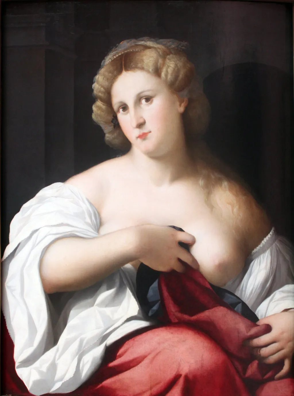 Portrait of a young woman with bare chest, by Palma Vecchio, oil, 1517