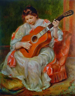 Woman Playing a Guitar