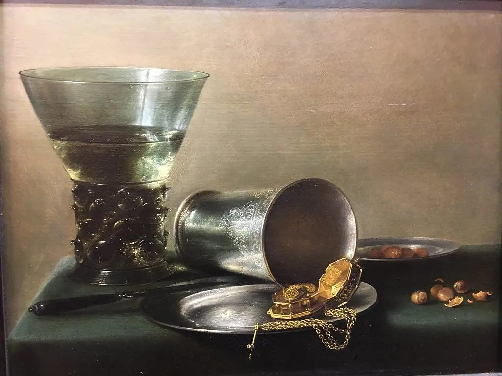 Still life with a large berkemeyer, silver chalice and a gold pocket watch
